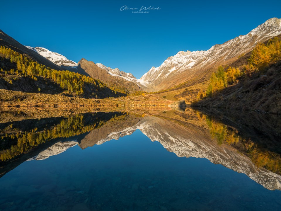 Fafleralp, Lötschental, Grundsee, Herbst, Herbstlicht, Autumn, Wallis, Valais, Landschaftsfoto Herbst, Herbstfoto, Landschaftsbilder Herbst, Fujifilm GFX Landscape, GFX Landscapes, Landscape Photography, Fall, Swiss Landscape, Schweizer Landschaftsfotografie, Landschaftsfotografie Schweiz, Herbstfoto Schweiz, Landschaftsfotografie, Landschaftsfotograf Schweiz, Landschaftsbild Wallis Herbst, Indian Summer, Swiss Indian Summer, Swiss Landscapes